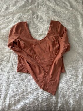 Lululemon align Long Sleeve Scoop Neck Women's Top in dark blush color